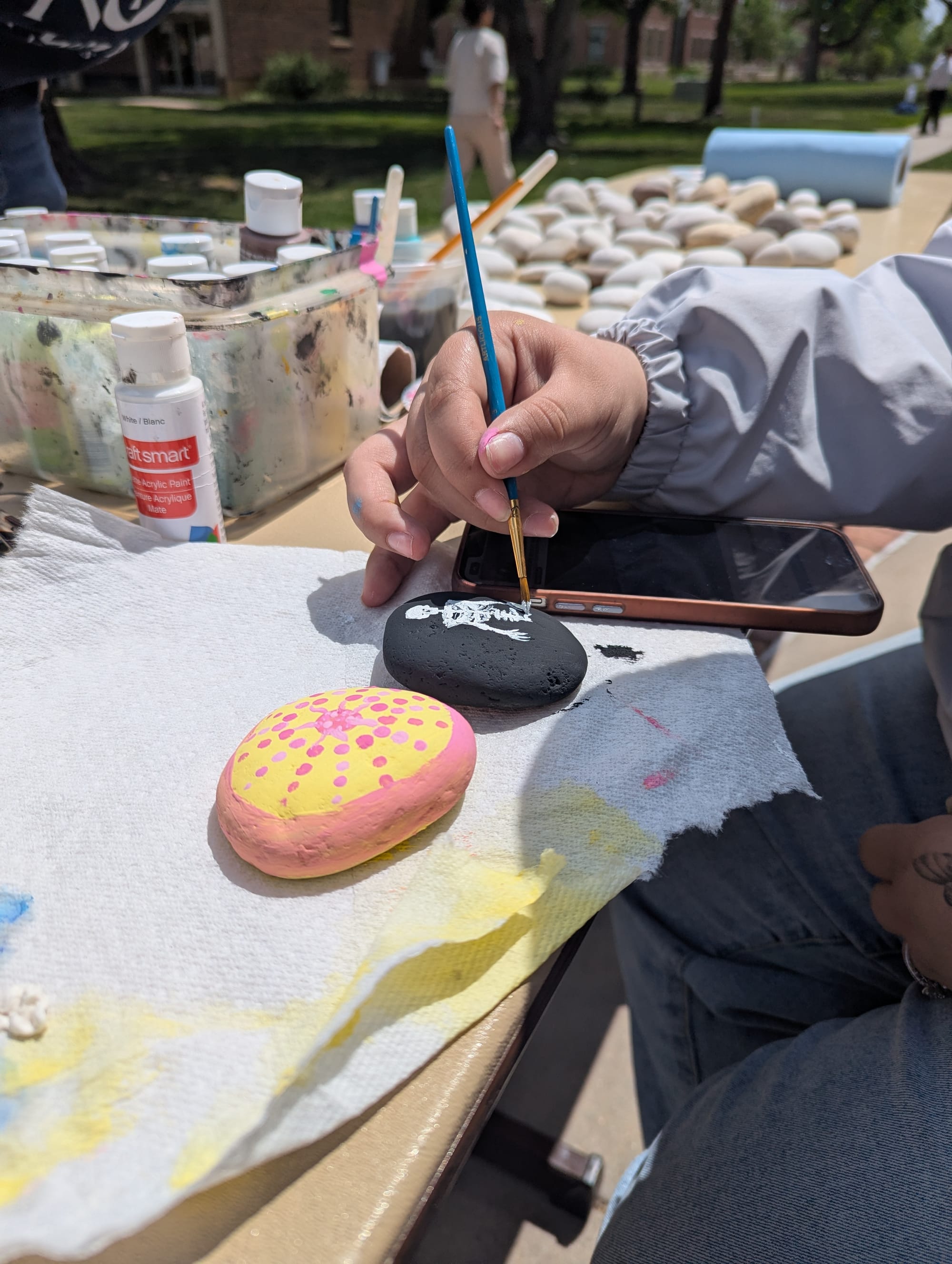 Earth Week Festival at Newman includes fun with rocks
