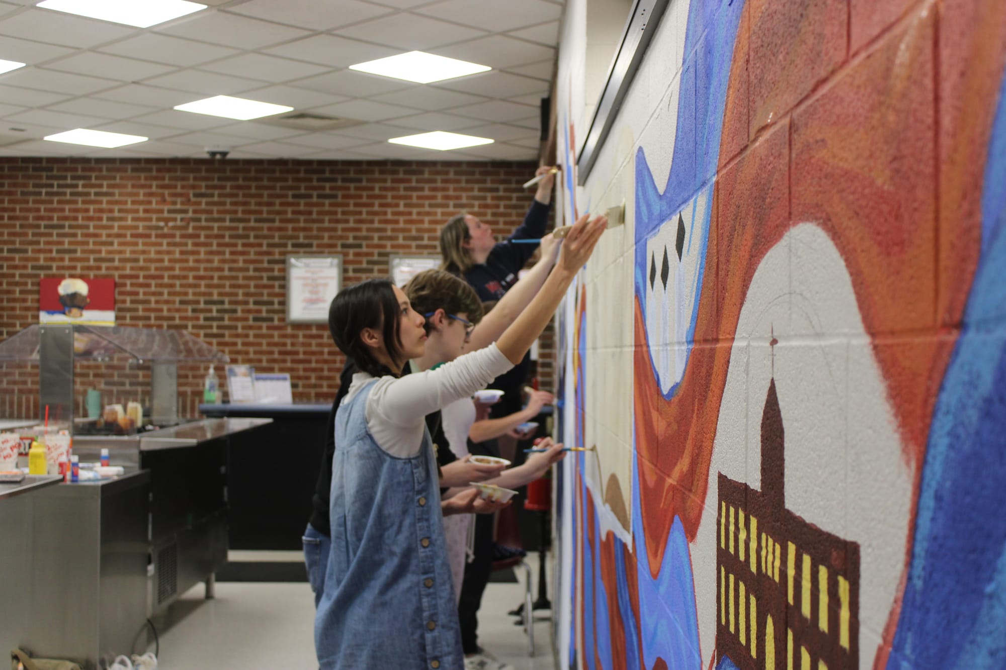 Art students express creativity  with mural in Mabee Dining Hall