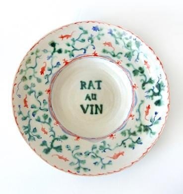 A plate with a design on it

Description automatically generated