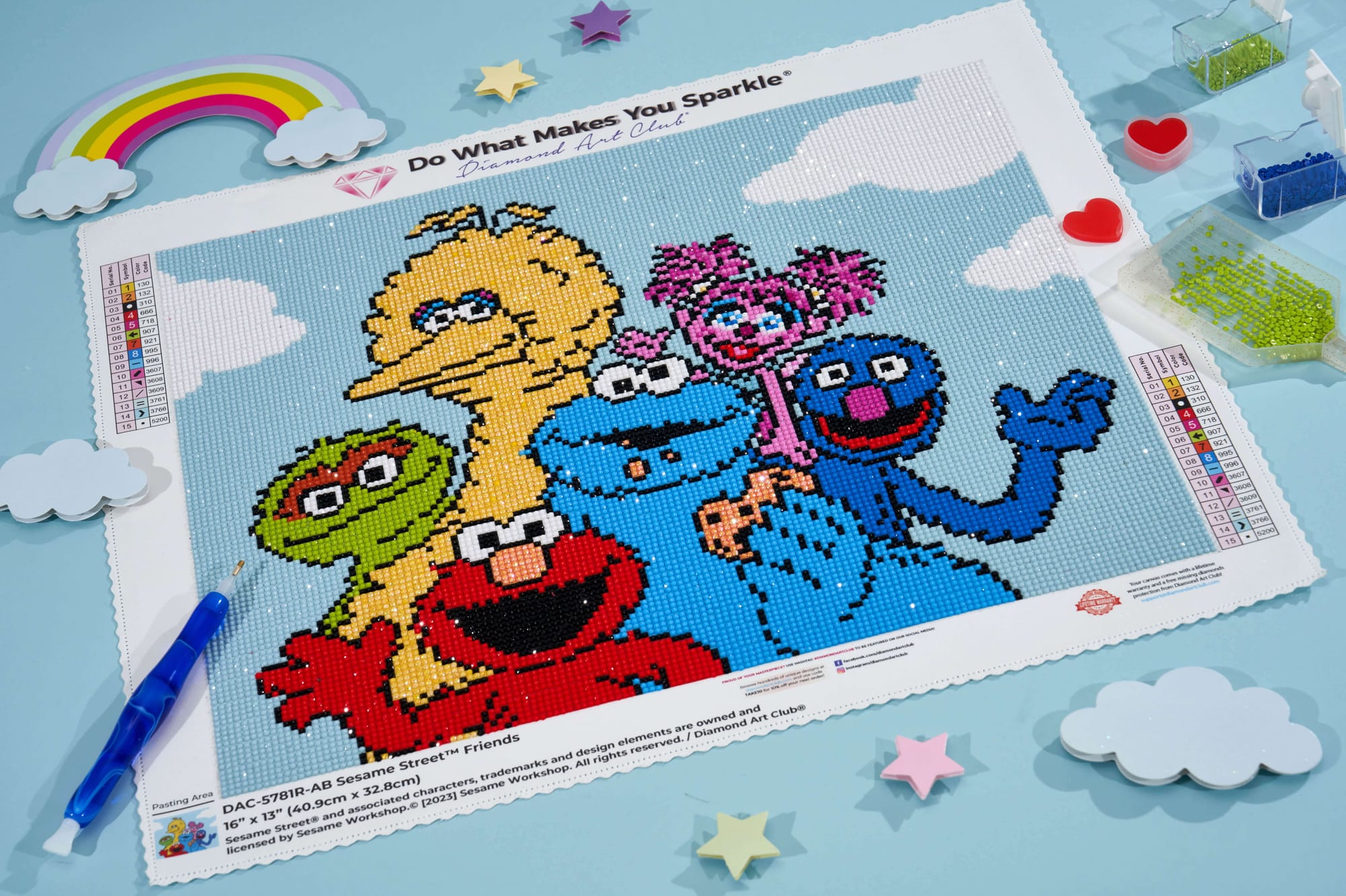A photo of a Sesame Street diamond art kit showing Elmo, Big Bird, Cookie Monster, Oscar, Abby Cadabby, and Grover.&nbsp;