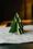 image of a paper christmas tree that is green on a table