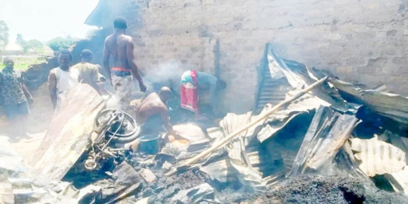 The aftermath of the Yeletawa massacre: shattered properties, lost lives, and grieving survivors gathering the remains of their loved ones. A tragic scene of pain, resilience, and irreversible loss. Photo: Ebenezer Dadzie