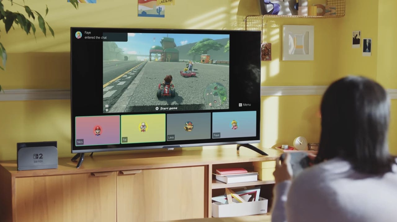 A woman playing Mario Kart World on Switch 2 with three other people visible on screen