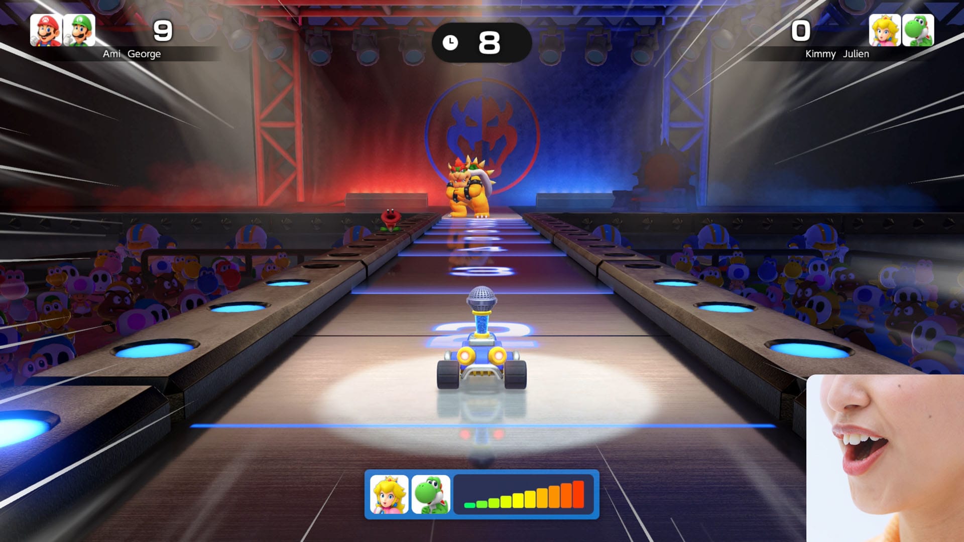 An RC vehicle driving down a runway towards Bowser, player's face below the eyes can be seen in right bottom corner
