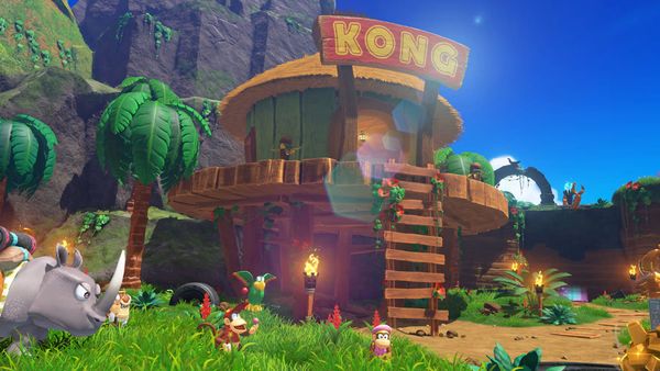 Hut with the word "Kong" above the entry, ladder leading up to it's entry with Diddy Kong, Dixie Kong and Rambi sat nearby
