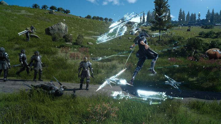 Shows Noctis surrounded by floating weapons. 