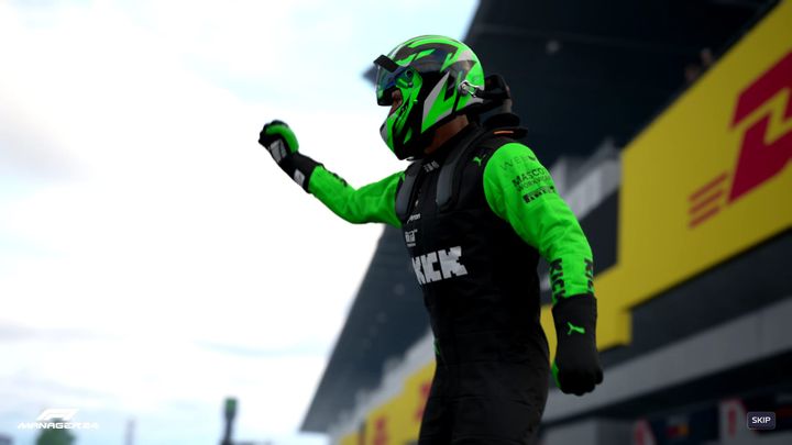 Nico Hulkenberg wearing a helmet and the green and black Kick Sauber team outfit celebrating a good result