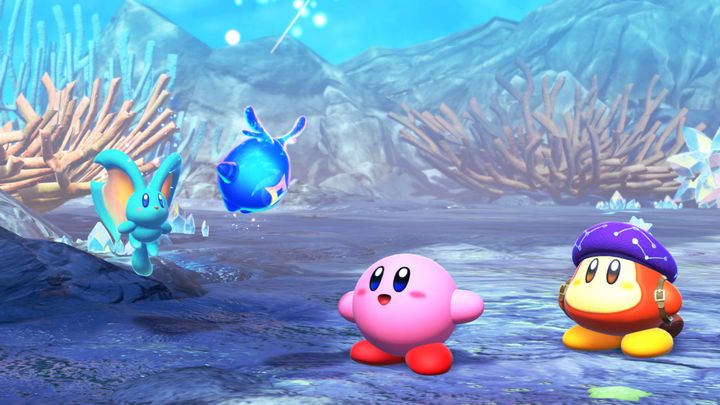 Kirby and the forgotten land screenshot showing kirby and a few friends