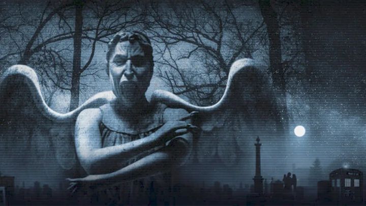 A grey Weeping angel appearing with trees behind it, a Tardis can be seen in bottom right corner