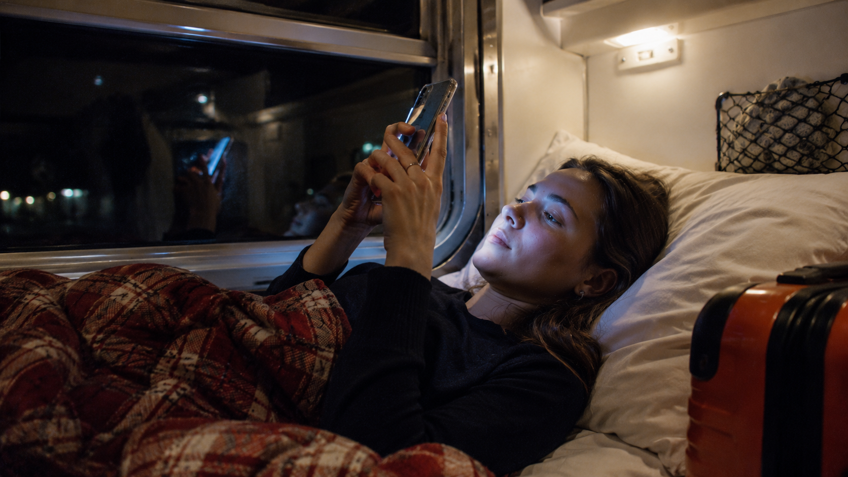 Personne dans une couchette de train de nuit