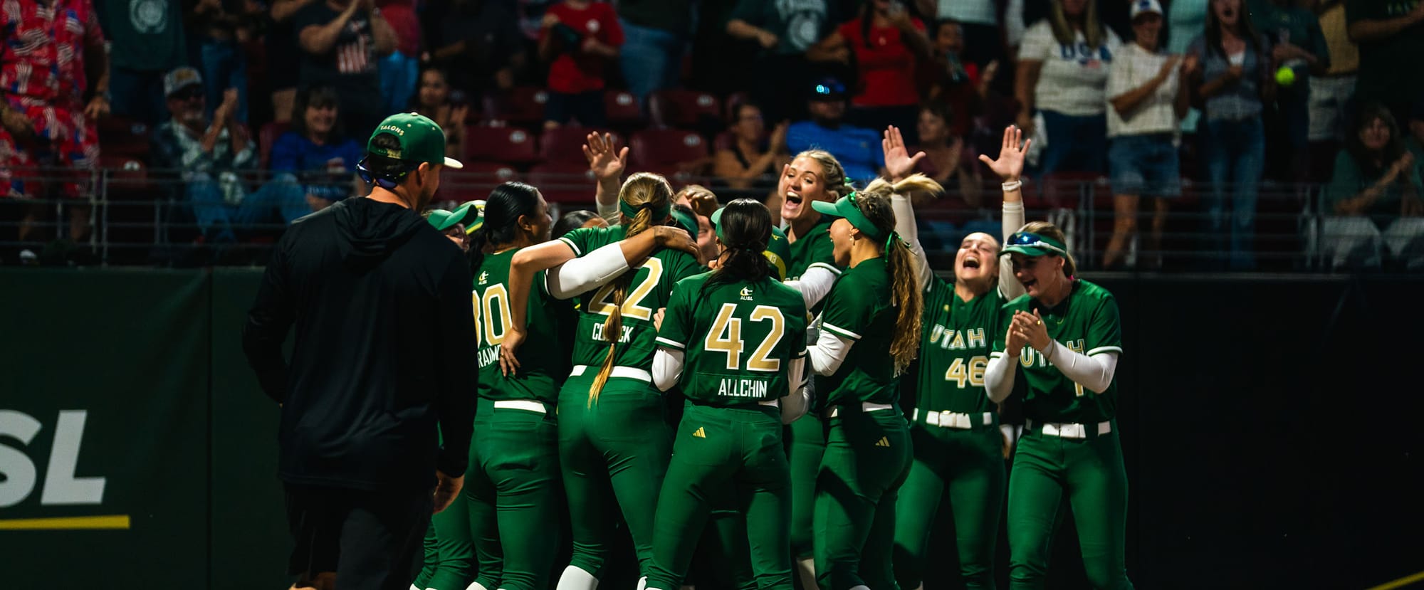 Utah Talons slugger Bri Ellis celebrates a walk-off home run with teammates