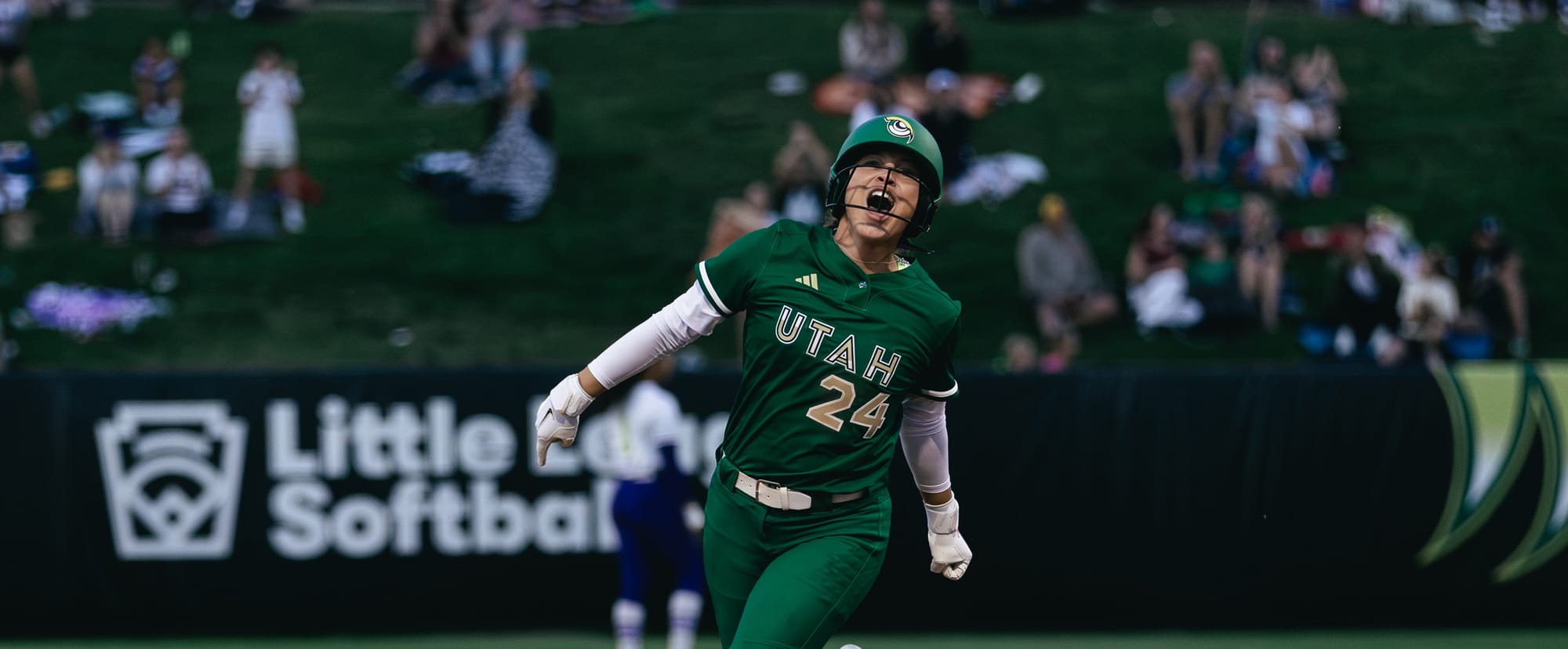 Utah Talons outfielder Jayda Coleman roars as she rounds the bases after a home run