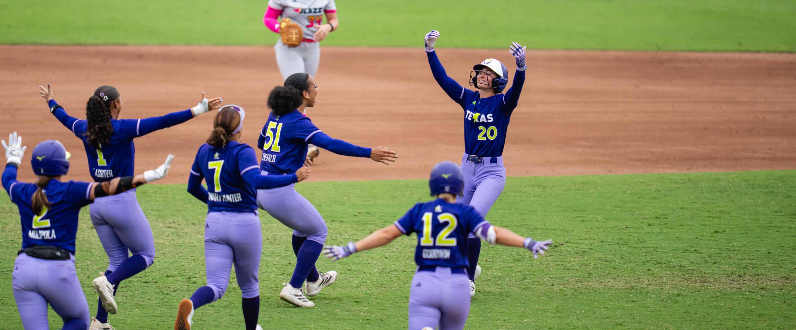 Texas Volts infielder Jackie Lis celebrates a walk-off single against the Carolina Blaze