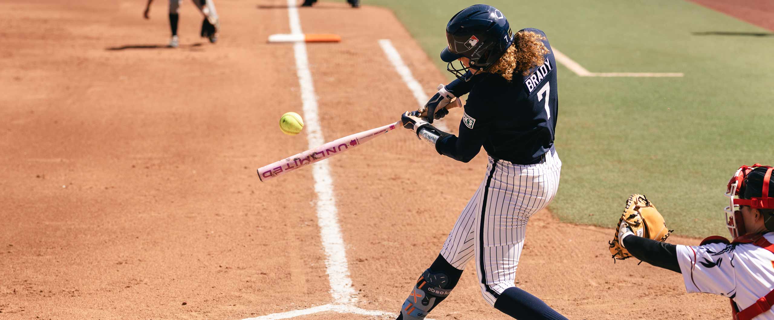 Maya Brady swings for Team USA at Devon Park during the WBSC World Cup Group C event