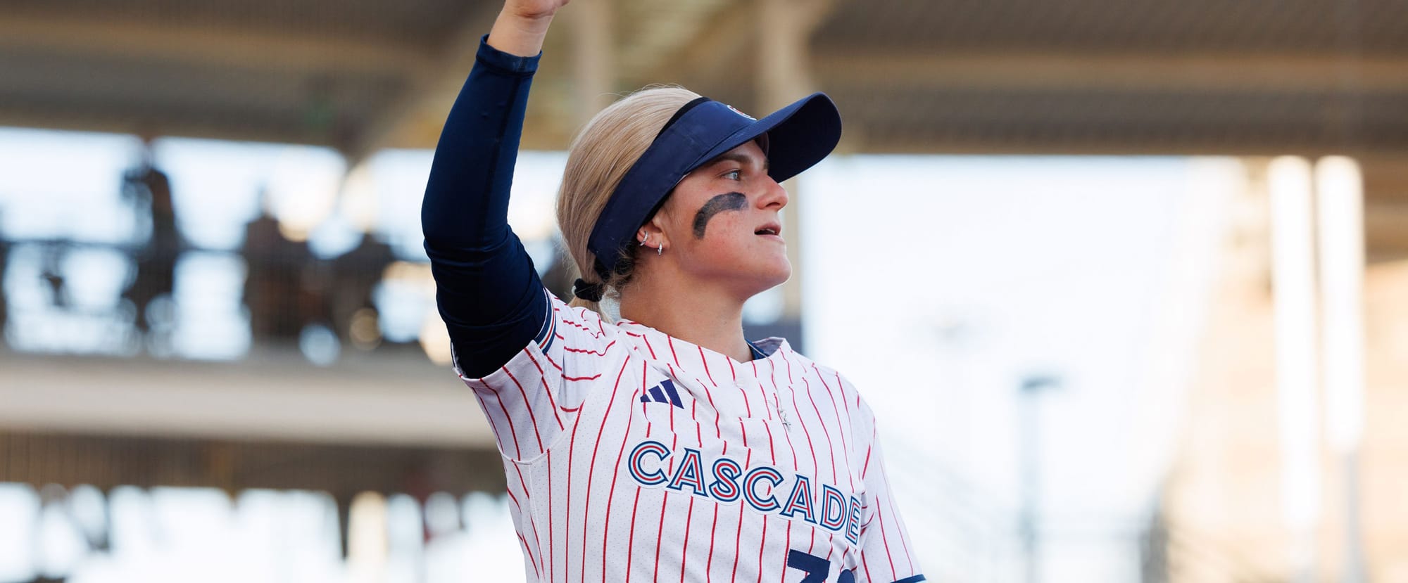 Paige Sinicki waves in a Portland Cascade uniform