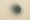Soft circular layers pulling inward to suggest the slow, subtle trap of alcohol dependence.