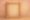 Abstract blurred golden picture frame symbolizing nostalgic, rose-tinted memories and the deceptive Rosy Effect linked to alcohol