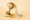 A golden trophy melting into liquid, symbolizing the false reward of alcohol and its hollow value.
