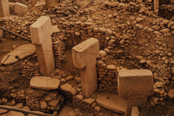  Ancient archaeological ruins with stone pillars and walls