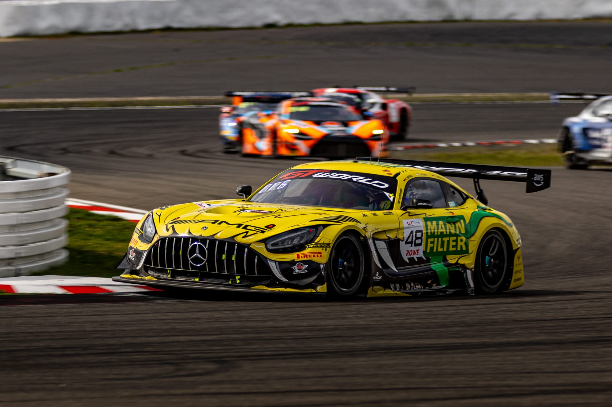 Number 48 Mercedes-AMG Team MANN-FILTER Mercedes-AMG GT3 EVO racing at the Nürburgring on its championship-clinching weekend.