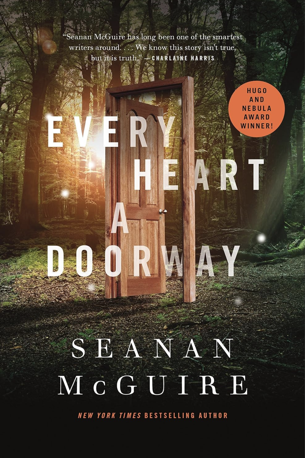 Every Heart a Doorway by Seanan McGuire book cover. A forest with a backlit stand alone wooden door frame with an open door, suggesting a portal.
