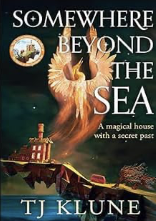 Somewhere Beyond the Sea by TJ Klune book cover. A victorian house sits on a cliff that hangs over the ocean. A red bus in front. A large phoenix rises into the night sky.