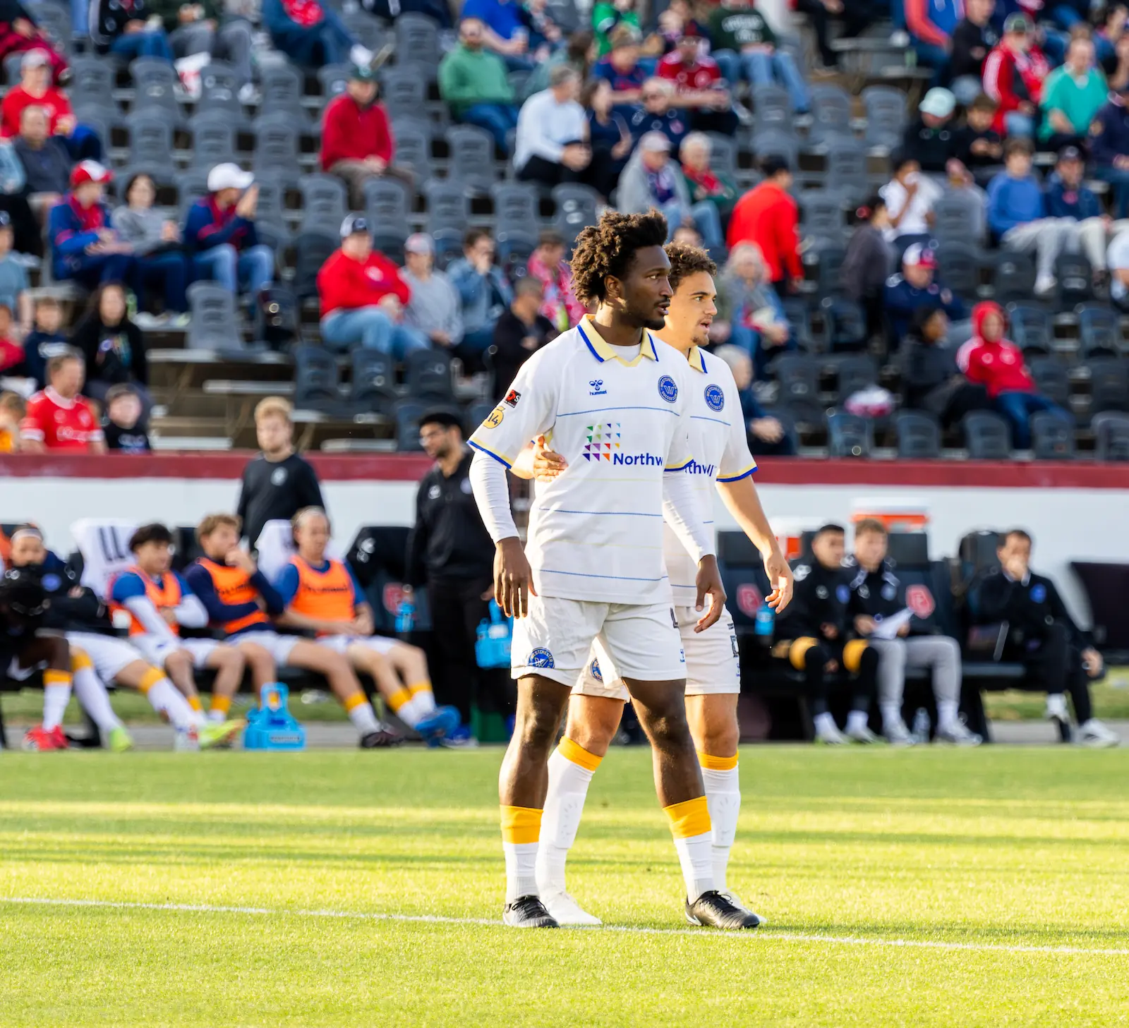 Westchester defenders Bobby Pierre and Max Jennings stand side by side during a soccer match.