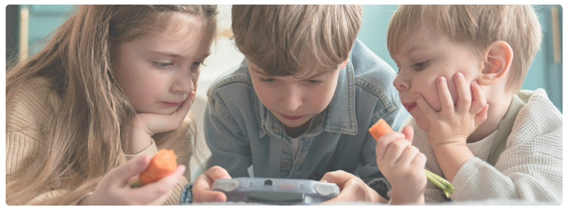 Kids co-playing video games on a screen