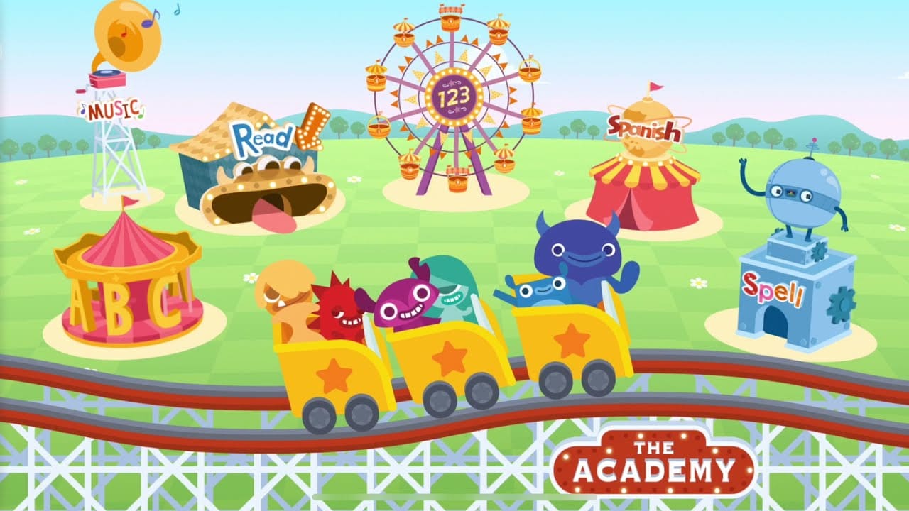 Screenshot from Endless Learning Academy showing colorful animated monsters riding a train through a theme park labeled with subjects like reading, math, Spanish, and music.