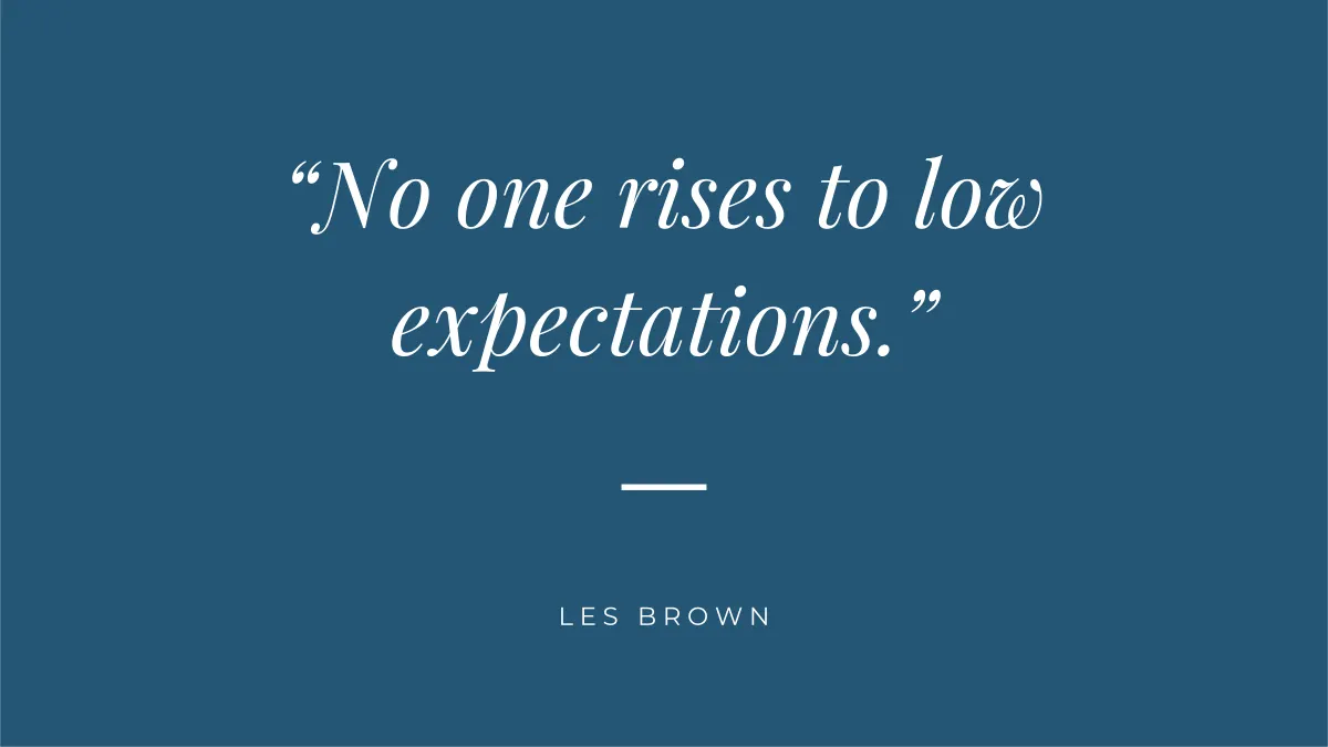 White text on a blue background which reads "No one rises to low expectations." Attributed to Les Brown.