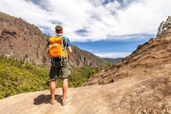 Hiker With Backpack Wearing Trail Runner 