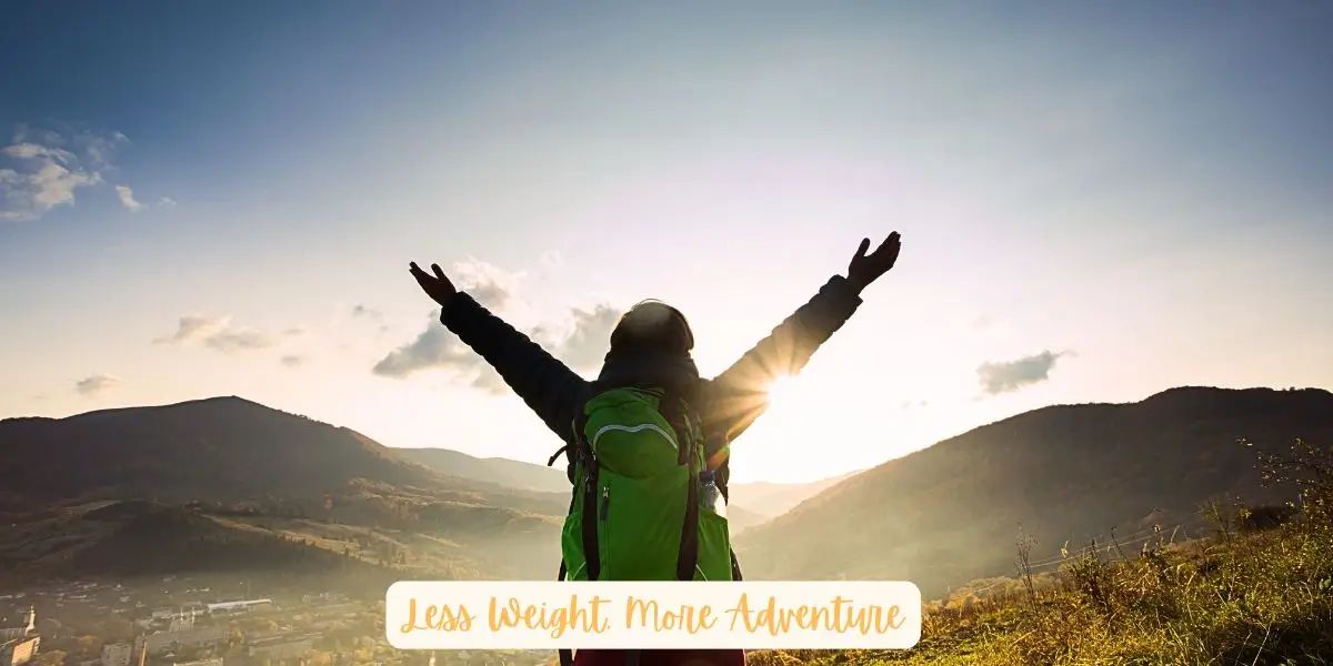 A hiker with a green backpack stands on a mountain ridge at sunrise. Lighter Backpack means more adventure.