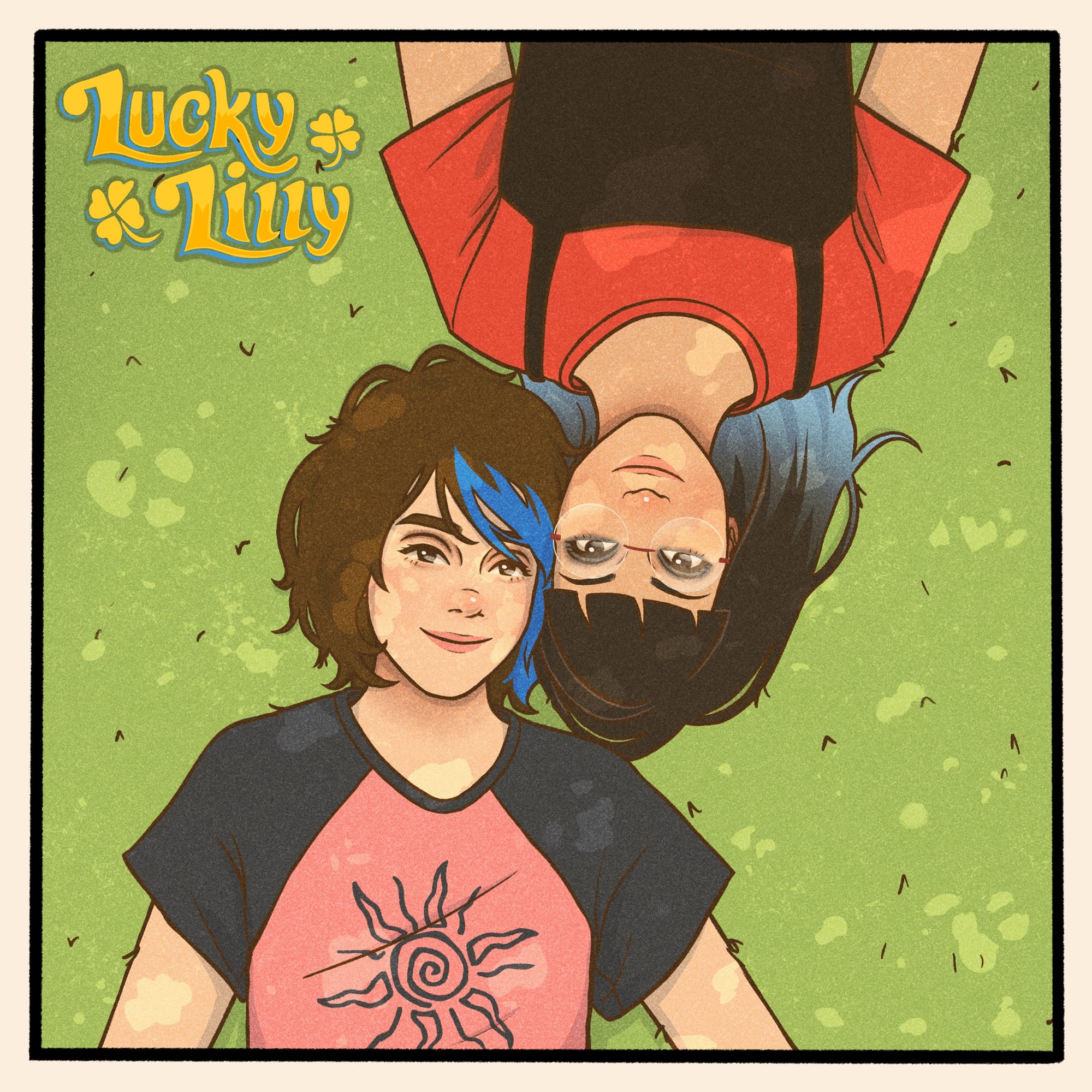  Two girls, one with short hair and one with long hair, both brown hair with blue streak, laying on the grass