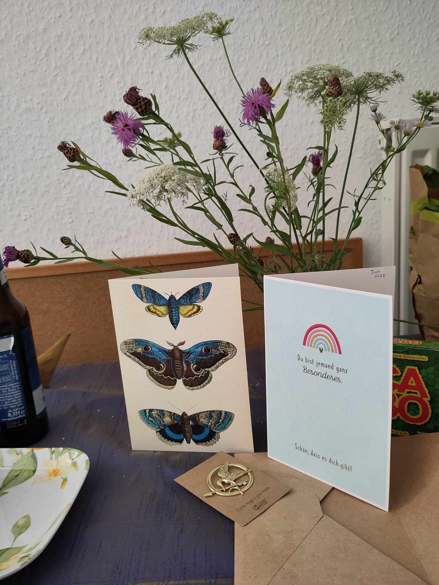 cards, flowers, and gifts celebrating transformation and blooming