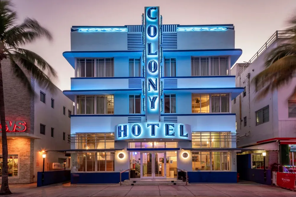 Illuminated neon front of the Colony Hotel, one of Miami’s most famous Art Deco hotel.