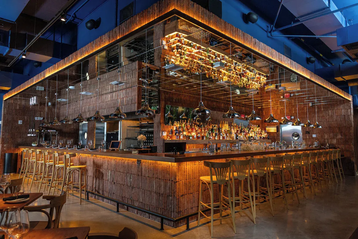 Lobby bar at Sentral Wynwood Miami with modern design and social vibe, apartment-style hotel popular with Ultra Miami 2026 groups.