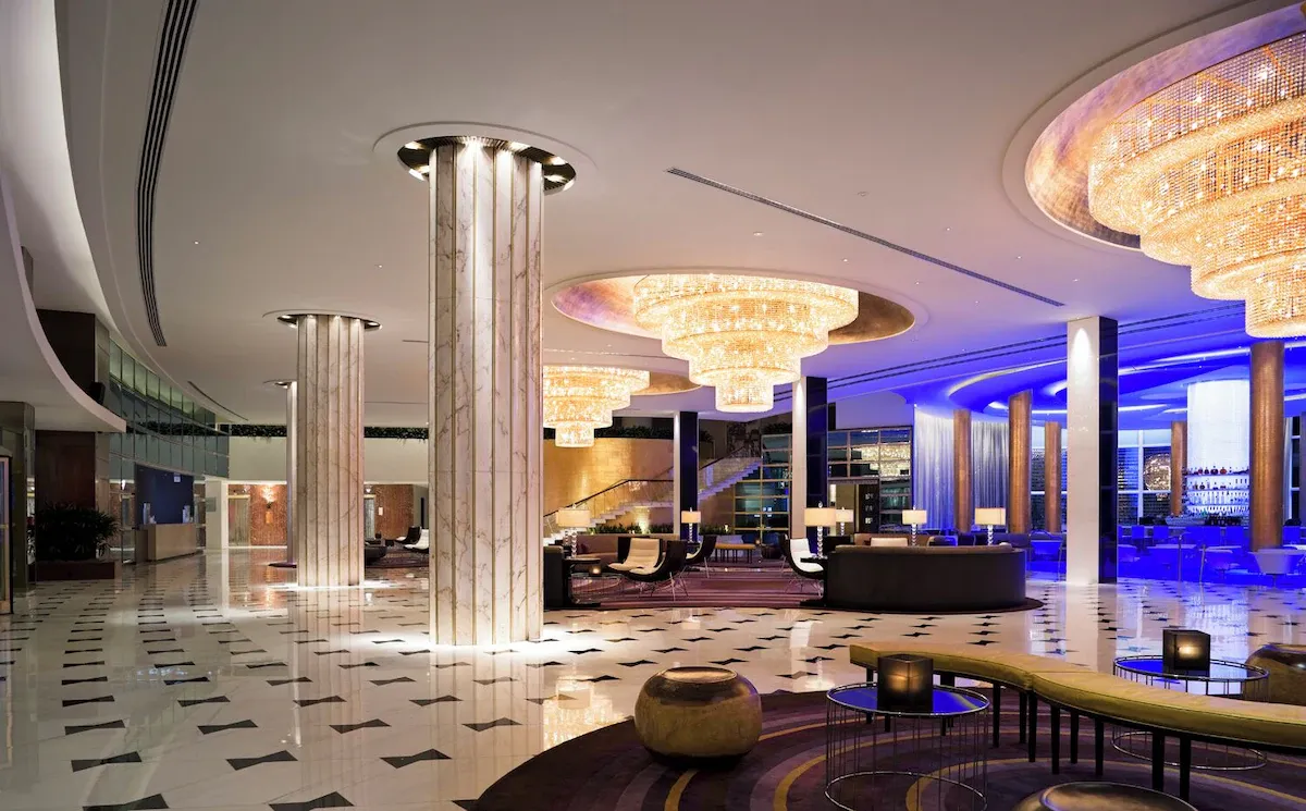 Grand lobby of Fontainebleau Miami Beach hotel, iconic spot for New Year’s Eve in Miami.