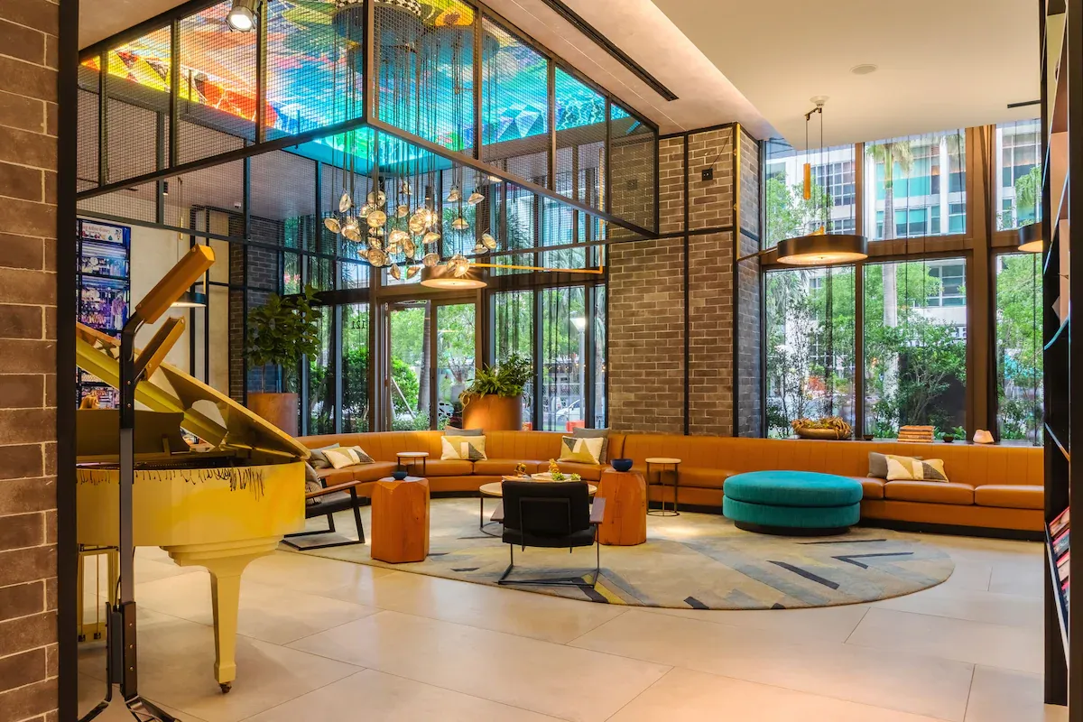 Modern lobby at Hyde Suites Midtown Miami with stylish design, a top hotel choice for New Year’s Eve in Miami.