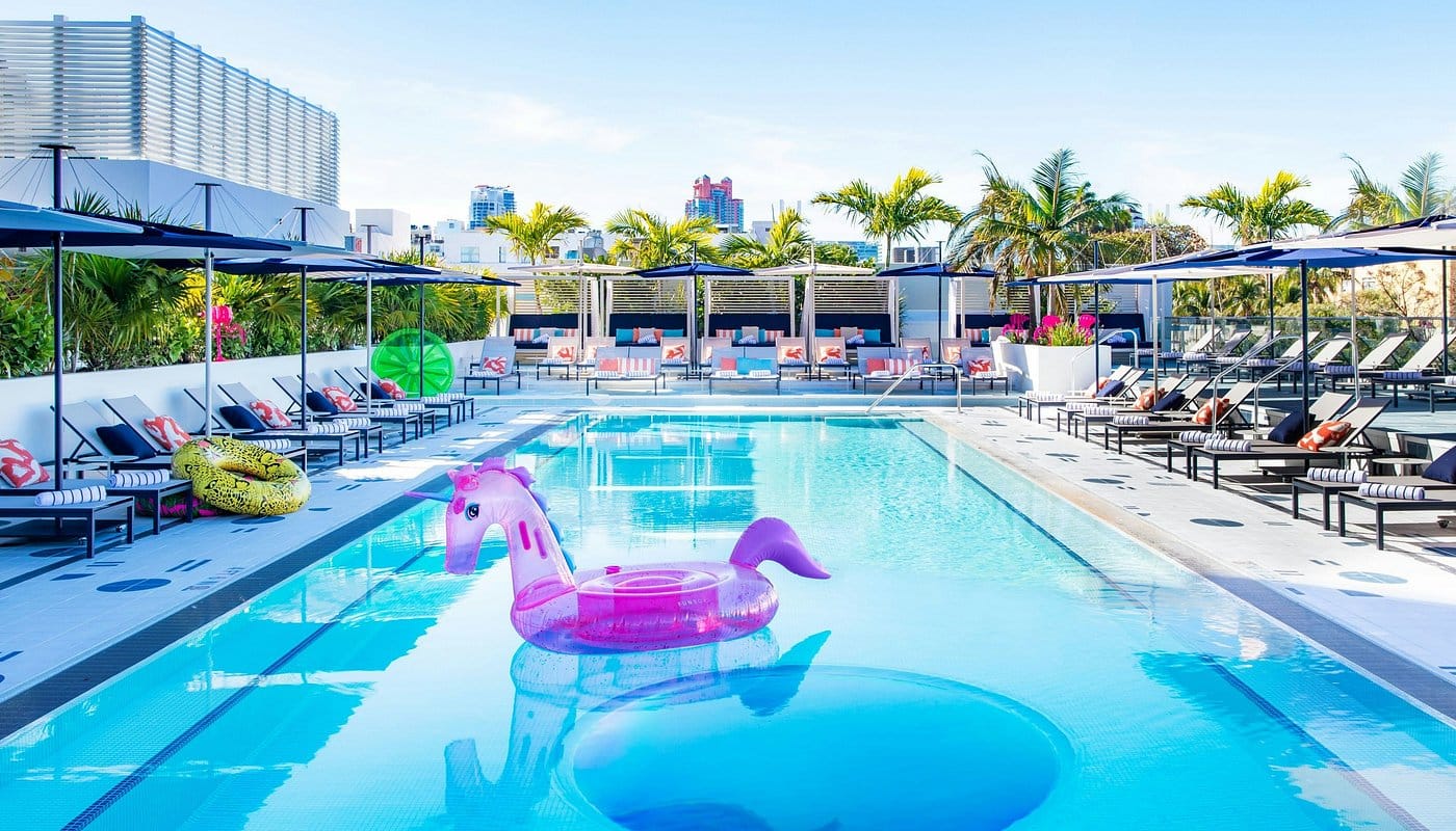Rooftop pool at Moxy Miami South Beach with cabanas and ocean views, trendy hotel for Ultra Miami 2026 festival-goers.