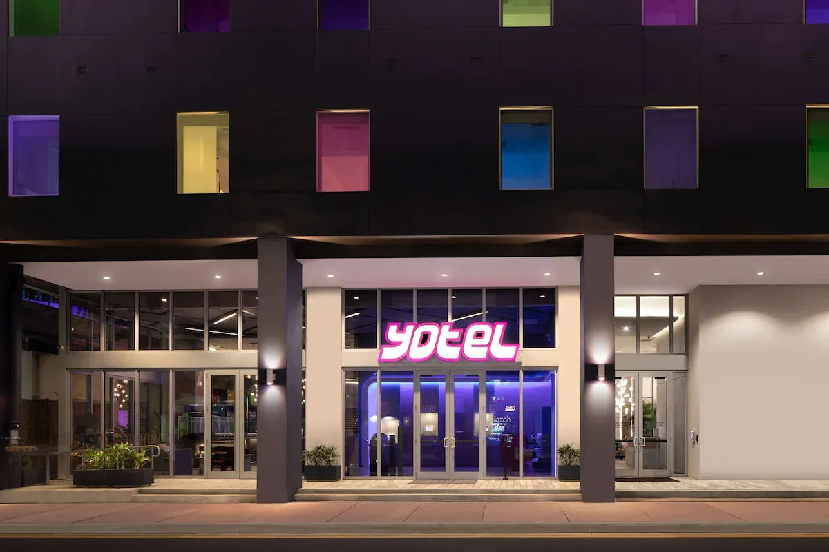 Modern facade of YOTEL Miami Downtown near Bayfront Park with smart budget rooms for Ultra Miami 2026 travelers