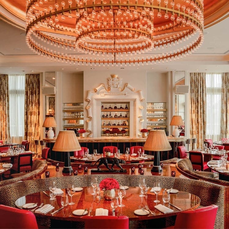Elegant dining room at Faena Hotel Miami Beach with Art Deco design and vibrant décor, offering a luxury experience at the best hotel in Miami Beach