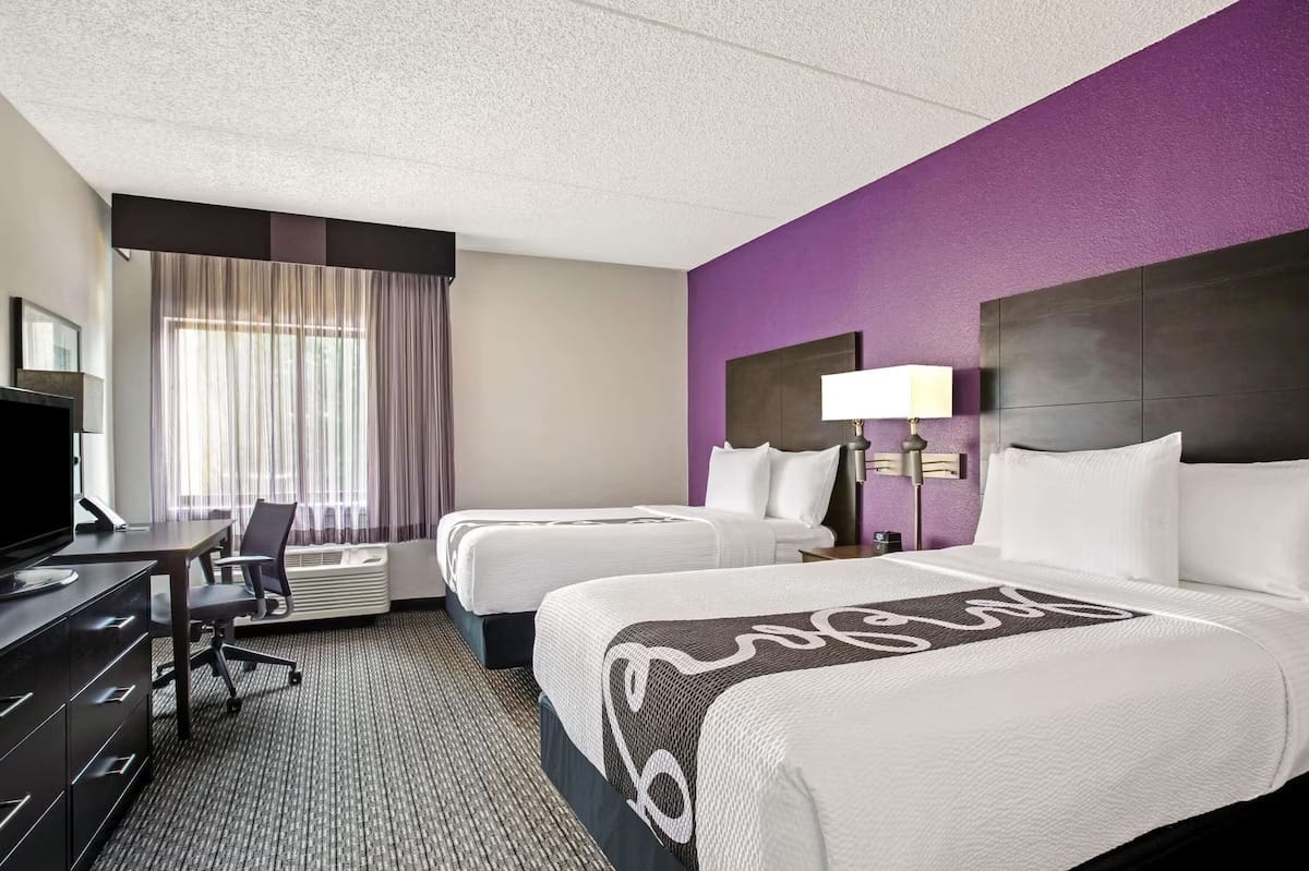 Guest room at La Quinta Inn & Suites Miami Airport — budget hotel near MIA