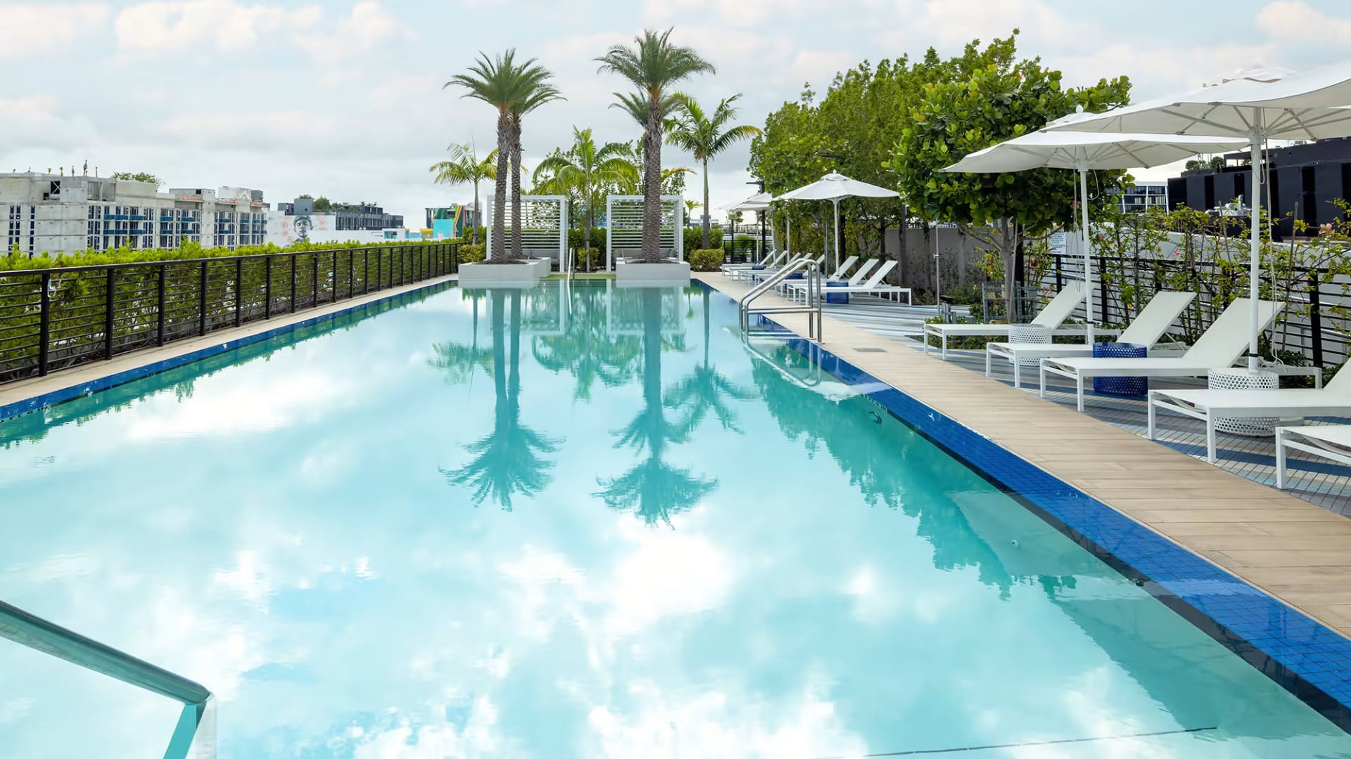Rooftop pool at Sentral Wynwood — family-friendly lounging with Miami skyline views