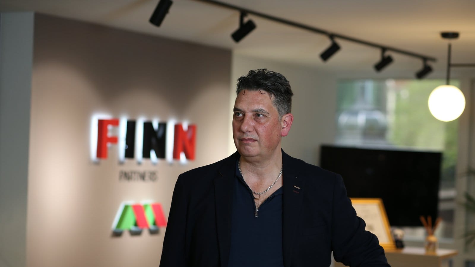 Elliott King, Managing Partner at FINN Partners and AI visibility expert, photographed at FINN Partners London.