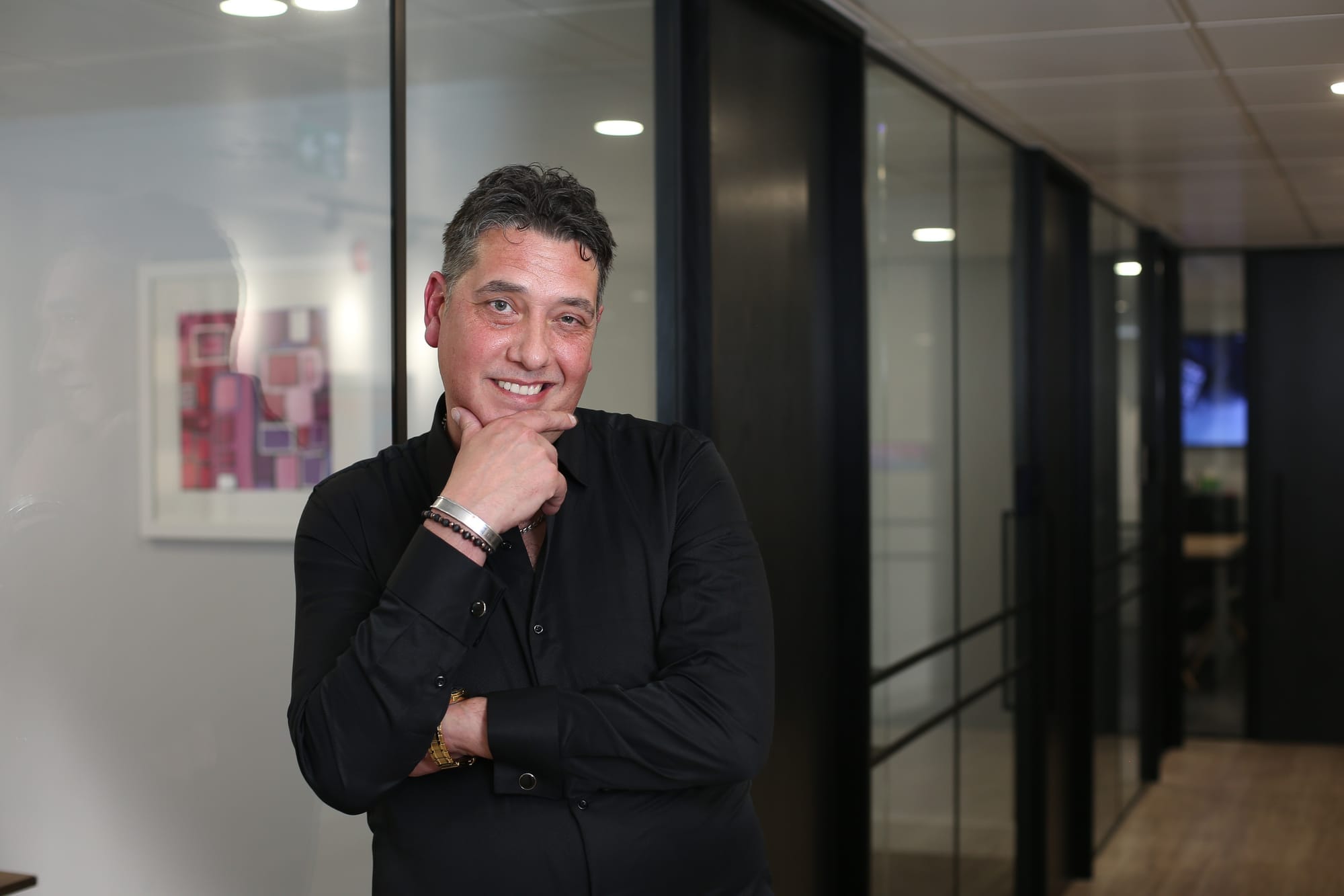 Elliott King, AI visibility expert Elliott King, AI visibility expert, in a black shirt in the FINN Partners London office