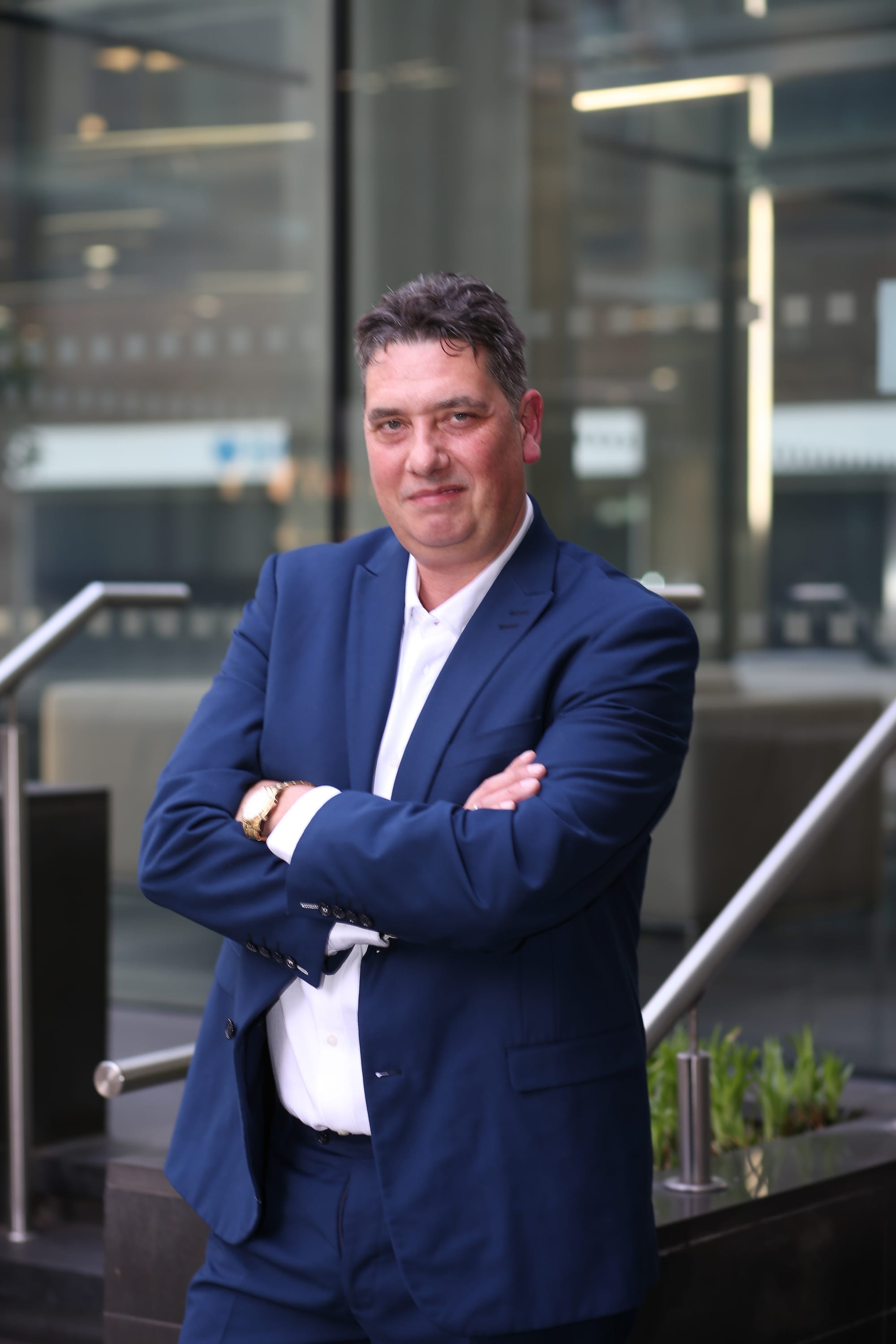 Elliott King, Managing Partner at FINN Partners Elliott King, Managing Partner at FINN Partners, in a navy suit outside the London office