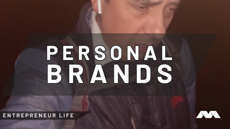 Dark selfie-style video thumbnail of a man wearing an earbud, captioned PERSONAL BRANDS, ENTREPRENEUR LIFE.
