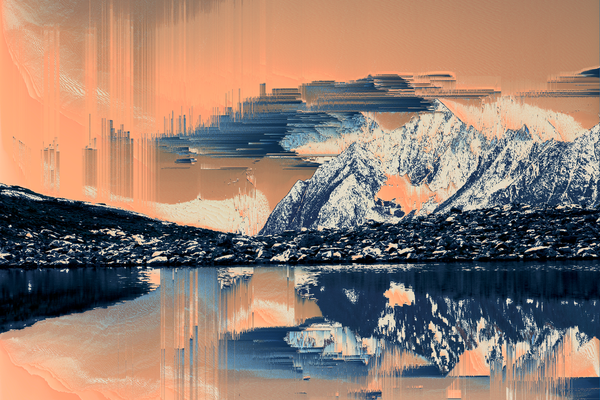 Paesaggio con montagna che si riflette in un lago.