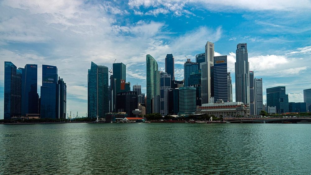 MAS pauses tightening and keeps Singapore dollar on appreciating path