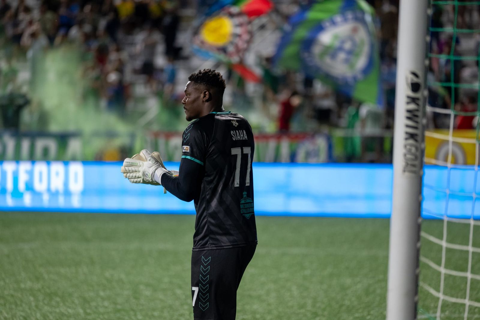 Antony Siaha claps during a Hartford Athletic match
